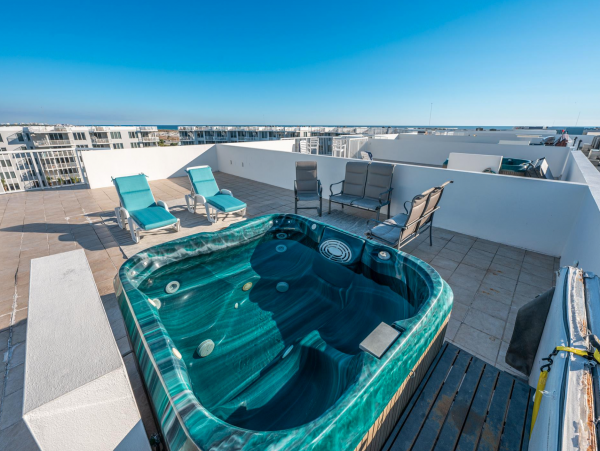 Sweeping views of Bay and Gulf from Private rooftop patio